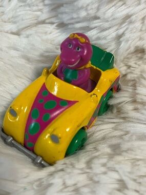 Barney the dinosaur in die cast car toy